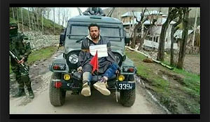 Kashmir man tied to on jeep