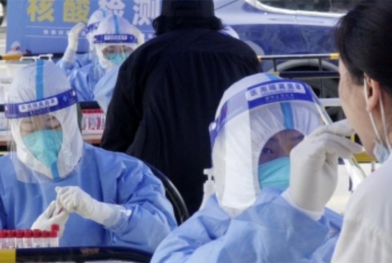 Dead bodies pile on top of each other in morgues as Covid sweeps through Beijing