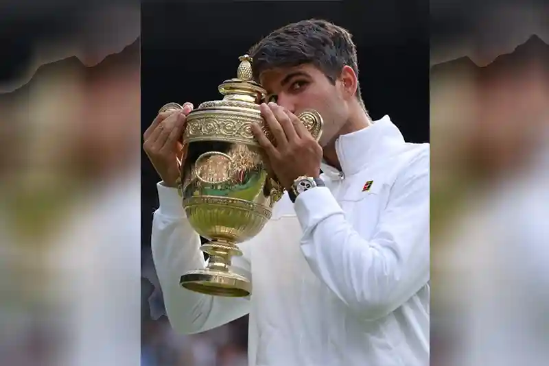 Carlos Alcaraz holding Wimbledon 2024: Carlos Alcaraz lifts Men’s Single Trophy 2024
